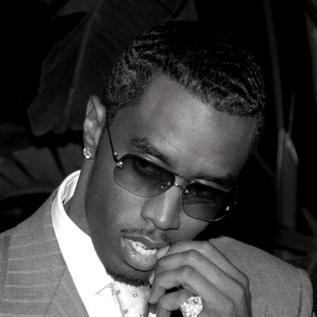 Homme noir (P.diddy) avec des 360 waves